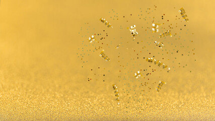 Blurred golden glitter holiday background with shiny confetti with copy space.