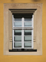 Renaissance window at the Beguines House facade in the old town of Kitzingen in Germany