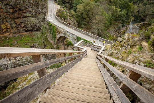 wooden staircase going down to Alvarenga bridge (Canelas bridge) over Paiva river, Municipality of Arouca, Aveiro District, Portugal