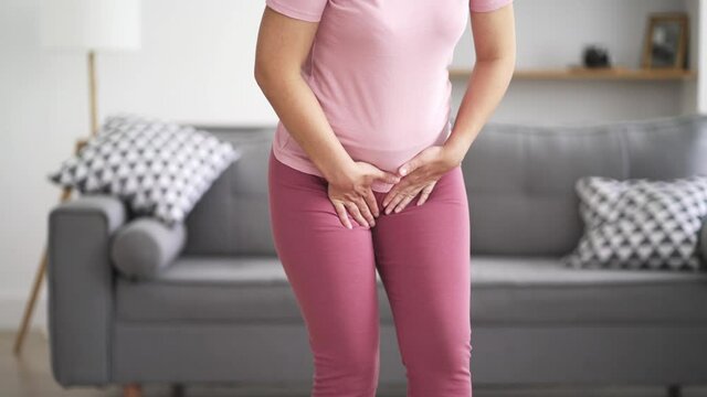 Menstrual pain, woman with stomachache suffering from pms at home, endometriosis, cystitis and other diseases of the urinary system, health problems concept