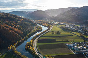 Aerial view of the river Mur near Graz with the hydroelectric power plant in Peggau-Deutschfeistritz