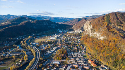 Aerial view of Peggau with the impressive rock face Peggauer Wand during autumn