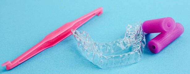 Transparent invisible dental aligners or braces applicable for an orthodontic dental treatment. Banner.	