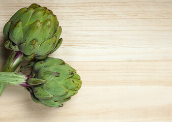 Fototapeta premium artichoke on wood background