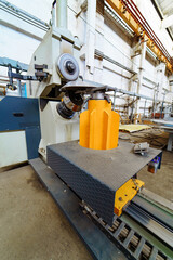 Indoor commercial large construction. Metal factoy big industrial equipment.