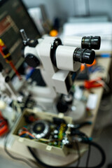 Obraz na płótnie Canvas Optician close up view equipment. Laboratory scientific researchment.