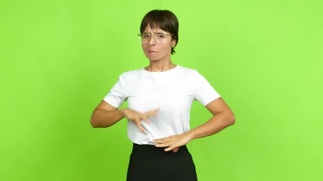 Young woman having doubts and questioning an idea over isolated background. Green screen chroma key