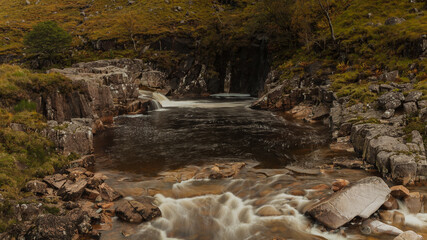  A small waterfall on a stream in Glen Etive Scotland.