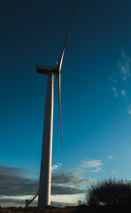 Lonely standing wind turbine against the sky. © Jaroslaw