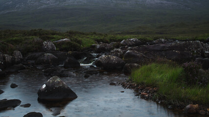 Mountain stream with raindrops. © Jaroslaw