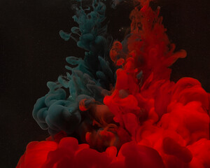 Abstract photo, red ink in water on a black background