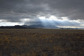 Sun Rays Through Monsoon Clouds in Nevada Desert 