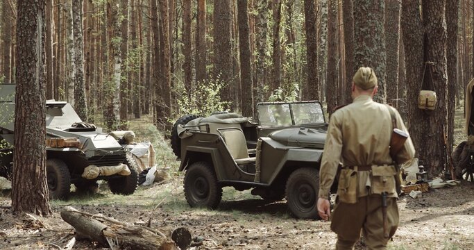 Set. Russian Soviet World War II Four-wheel Drive Army Truck Gaz-67 Car And Peasant Carts In Forest. WWII Equipment Of Red Army