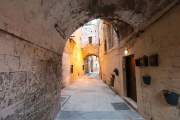 Narrow Italian street in old town, Taranto. Italy