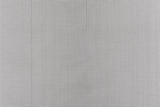 Background made from a macro photo of a fine metal mesh used for water filtration, isolated on a white background.