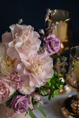 Beautiful flowers. Preserved roses with dried flowers bouquet closeup. Beautiful flower arrangement in a pink box.