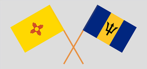 Crossed flags of the State of New Mexico and Barbados. Official colors. Correct proportion