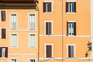 Fototapeta na wymiar Old building's facade in Navona Square (Piazza Navona). Rome, Italy, Feb 2015