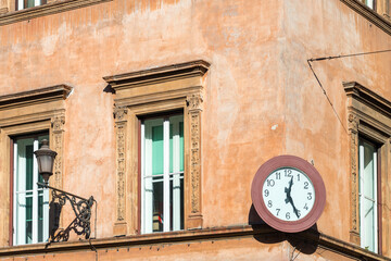 Fototapeta na wymiar Old building's facade in Navona Square (Piazza Navona). Rome, Italy, Feb 2015