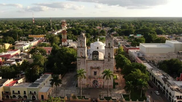 Aerial footage of a Cathedral of San Servacio, one of the most recognizable buildings in colonial town of Valladolid, Yucatan, Mexico. Iglesia de San Servacio. 4K drone video.