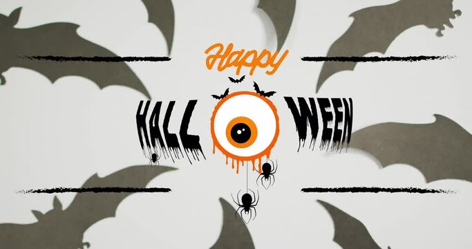 Happy halloween text banner with scary eye and spiders icons against multiple bat toys