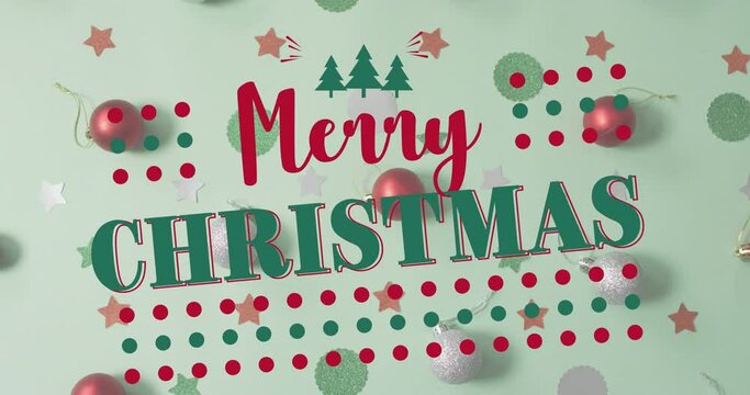 Animation of merry christmas text over christmas decorations
