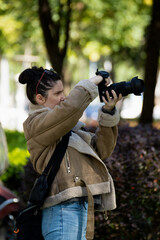 A female photographer taking a photo