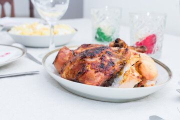 Homemade Honey-Roasted chicken served in elegant table