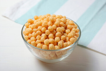 corn balls in glaze for breakfast close-up on the table