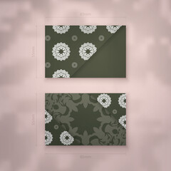 The business card is dark green with a luxurious white pattern for your personality.