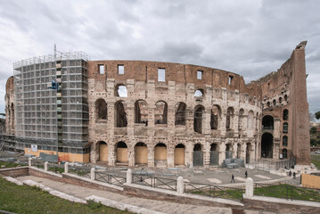 The Colosseum in Roman Forum. Construction began under the emperor Vespasian in 72 AD and was...