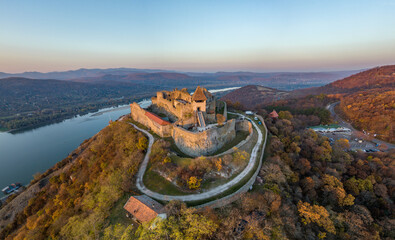 Hungary - The historical Visegrad Castle near Danube river from drone view at sunset