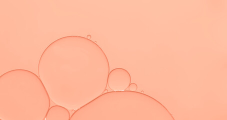 Beautiful oil bubble on pale orange background. ideal for background ,web title,screen saver etc.,