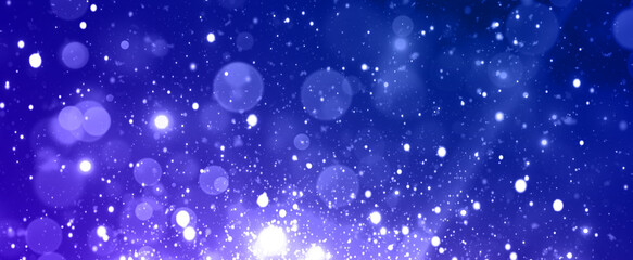 Obraz na płótnie Canvas 発光する光の粒とレンズフレア　宇宙　キラキラ夜空　幻想的　ネイビー　コバルトブルー　青　レンズフレア　反射