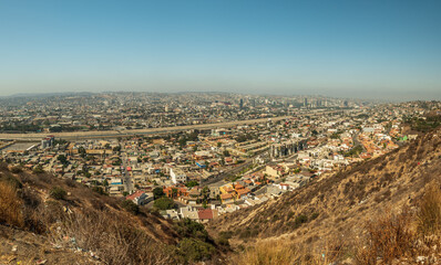 View of Tijuana, Mexico, Baja California. Trash strewn in foreground