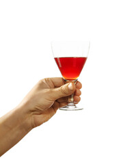 Glass of red wine in hand, isolated on white background