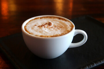 cup of hot cappuccino coffee