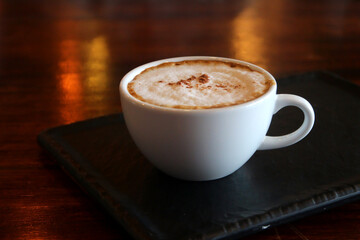 cup of hot cappuccino coffee