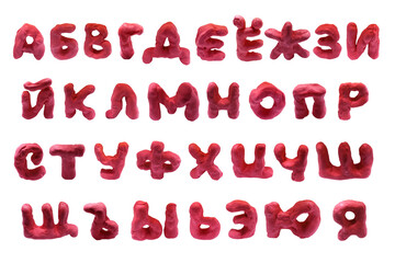 Volumetric letters of the Cyrillic alphabet from a single piece of red plastic