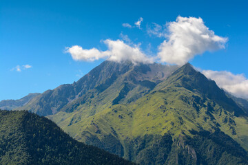 Fototapeta premium Peak of Pyrenean mountains with a blue sky, France