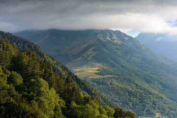 Peak of Pyrenean mountains with clouds, France