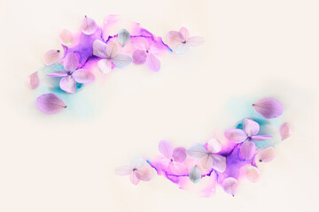Fototapeta na wymiar Creative image of pink and purple Hydrangea flowers on artistic ink background. Top view with copy space