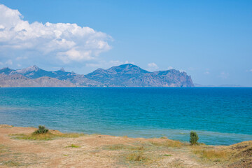 Fototapeta na wymiar View of the Black Sea and the Kara Dag volcano in Crimea