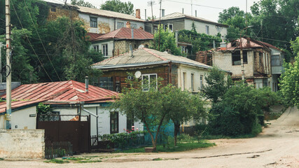 Fototapeta na wymiar old authentic houses on the outskirts of a European city