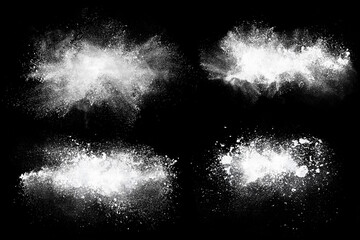 Set of dust powder clouds on black background