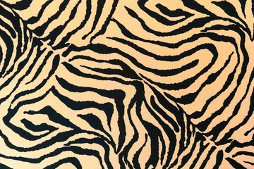 Naklejka premium Tiger fabric texture. Symbol of 2022 Tiger