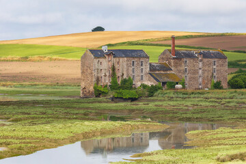 Saint Pere. France. 06-27-2021. Huge tide water mill at La Rance estuary. Brittany. France.