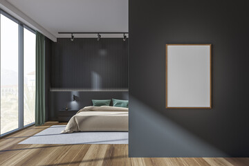 Dark bedroom interior with empty white poster, panoramic window