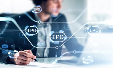 Businessman writing in paper, IPO icons, cryptocurrency and digital hologram with lines