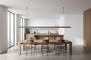 White and wood dining room with linear light and kitchen on background - obrazy, fototapety, plakaty